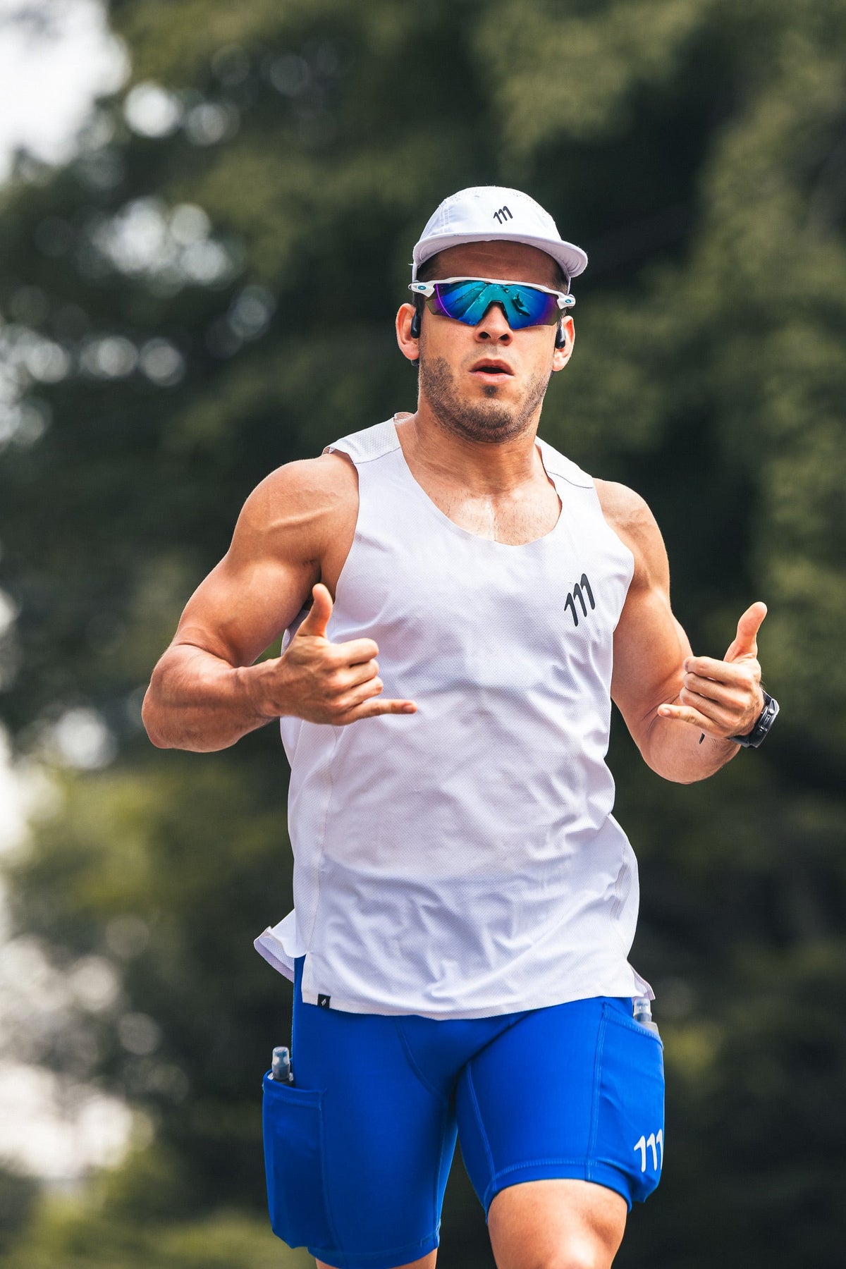 Atleta 111 · Hombres corriendo